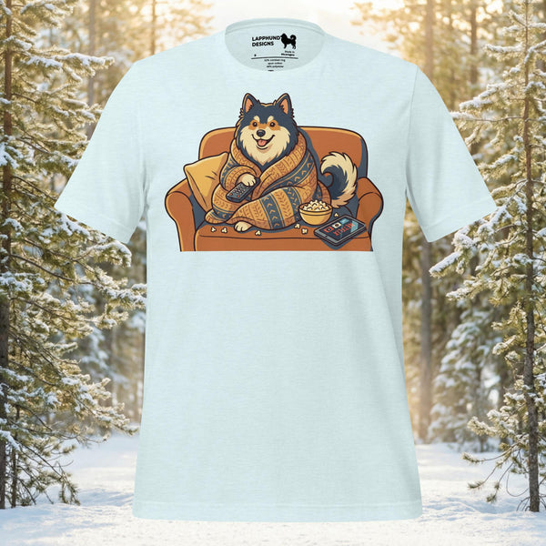 Finnish Lapphund illustrated relaxing on a couch with a blanket and cozy at-home details in a warm lounging scene on a graphic t-shirt