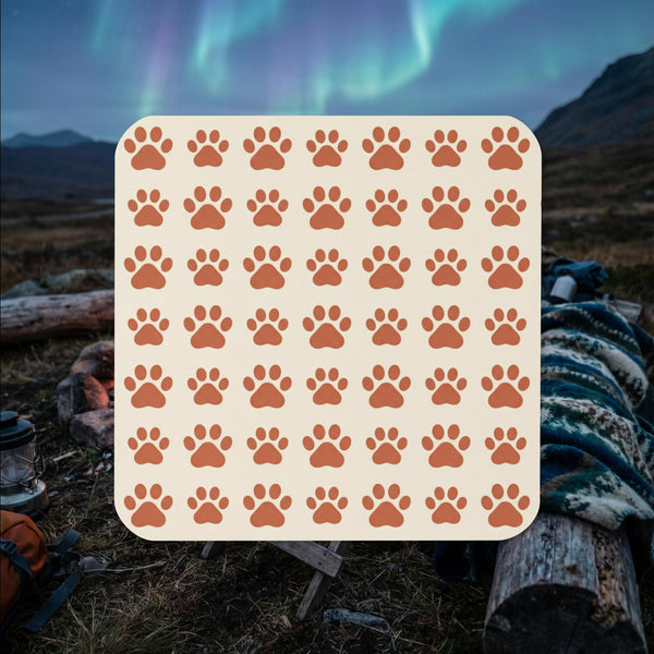 Finnish Lapphund paw print pattern cork-back coaster with repeating Nordic dog design