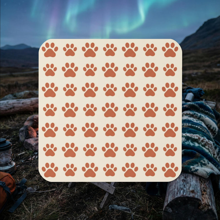 Finnish Lapphund paw print pattern cork-back coaster with repeating Nordic dog design