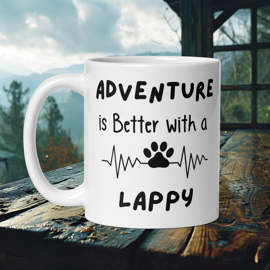 Finnish Lapphund Mug with "Adventure is Better With a Lappy" text and heartbeat paw print—ideal for dog lovers and adventurers.