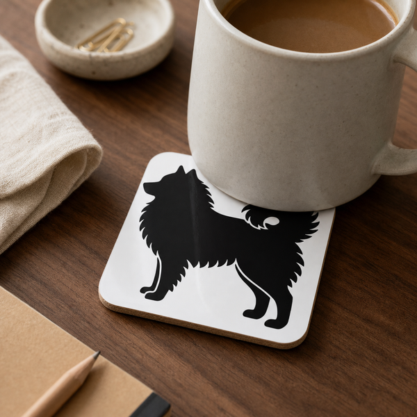 Black Finnish Lapphund Silhouette Lapphund Designs Logo Cork-Back Coaster Finnish Lapphund cork-back coaster in use on a table