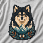 Finnish Lapphund Nordic Mountain Crest T-Shirt design close-up on a Finnish Lapphund t-shirt