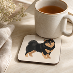 Finnish Lapphund Classic Full-Body Illustration Cork-Back Coaster Finnish Lapphund cork-back coaster in use on a table