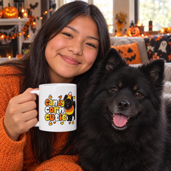Finnish Lapphund Candy Corn Cutie Halloween Mug Finnish Lapphund mug in use, lifestyle photo