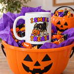 Finnish Lapphund I Smell Treats Halloween Mug Finnish Lapphund mug in a Halloween gift basket