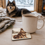 Finnish Lapphund Winter Cabin Illustration Cork-Back Coaster Finnish Lapphund cork-back coaster in use on a table