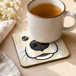 Finnish Lapphund Cream Face Cork-Back Coaster Finnish Lapphund cork-back coaster in use on a table