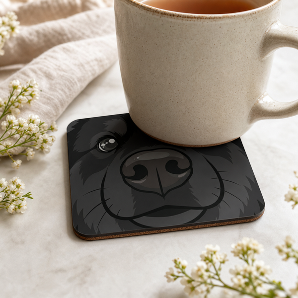 Finnish Lapphund Black Face Cork-Back Coaster Finnish Lapphund cork-back coaster in use on a table