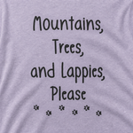 Mountains, Trees, and Lappies Please T-Shirt – Perfect for Lapphund Lovers & Nature Enthusiasts design close-up on a Finnish Lapphund t-shirt