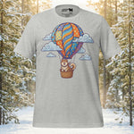 Finnish Lapphund illustrated sitting in a hot air balloon basket floating among soft clouds in a calm sky journey design on a graphic t-shirt