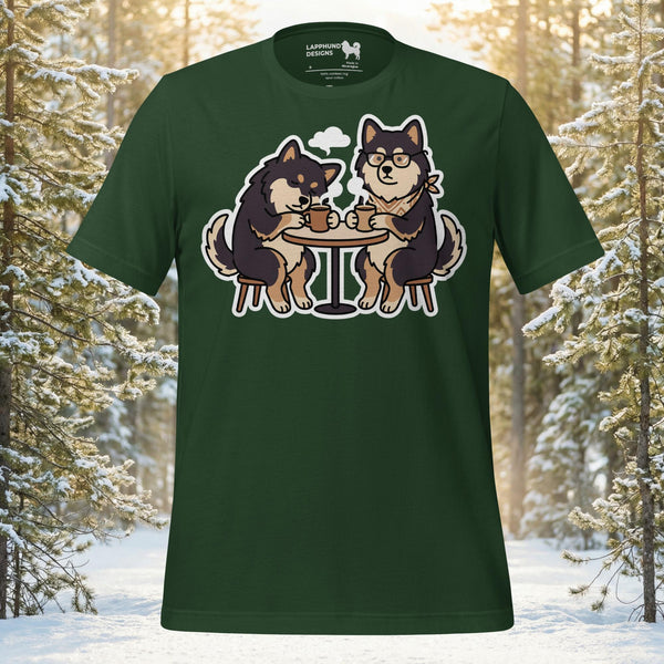 Two Finnish Lapphund dogs sitting at a table drinking coffee on a premium unisex t-shirt for dog lovers and outdoor enthusiasts.