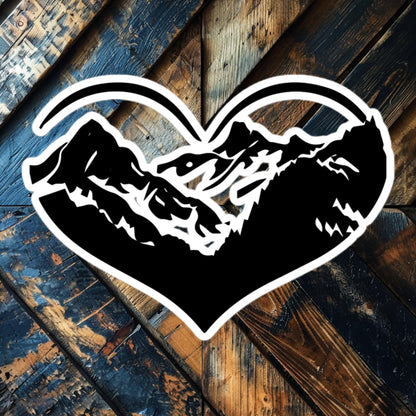 Mountain Heart vinyl sticker featuring a heart with mountain graphic, perfect for nature lovers and adventurers.