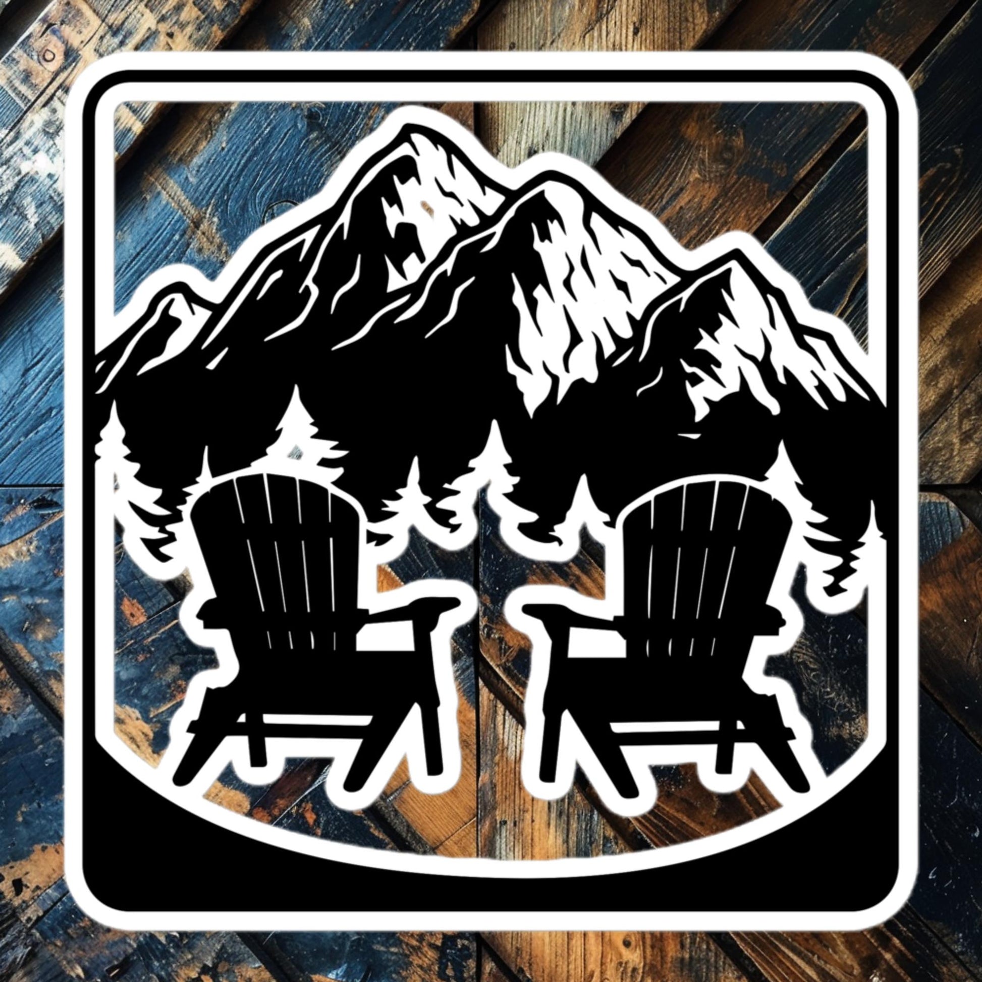 Mountain View Adirondack Chairs vinyl sticker featuring chairs with a mountain backdrop, perfect for nature lovers and campers.