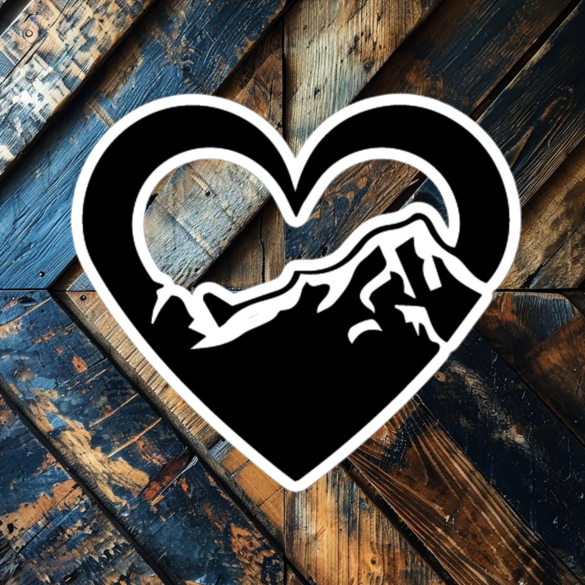 Mountain Heart Outline vinyl sticker featuring heart-shaped mountain peaks, perfect for nature lovers and adventurers.