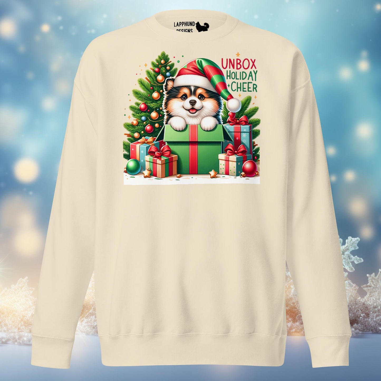 Unbox Holiday Cheer Finnish Lapphund Christmas sweatshirt featuring a Lapphund in a festive gift box by a Christmas tree.