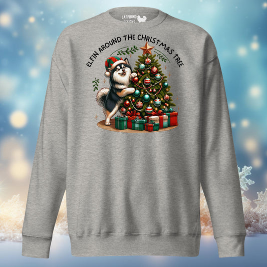 Elfing Around the Christmas Tree Finnish Lapphund sweatshirt featuring a Lapphund decorating a tree, perfect for festive holiday celebrations.