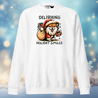 Delivering Holiday Smiles Finnish Lapphund Christmas Sweatshirt featuring a Lapphund dressed as Santa with festive gifts.