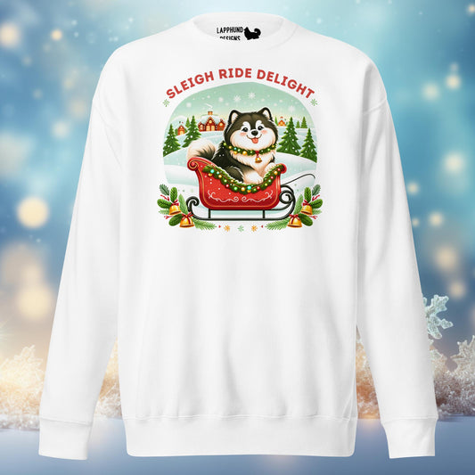 Sleigh Ride Delight Finnish Lapphund Christmas sweatshirt featuring a joyful Lapphund in a festive sleigh amidst a snowy backdrop.