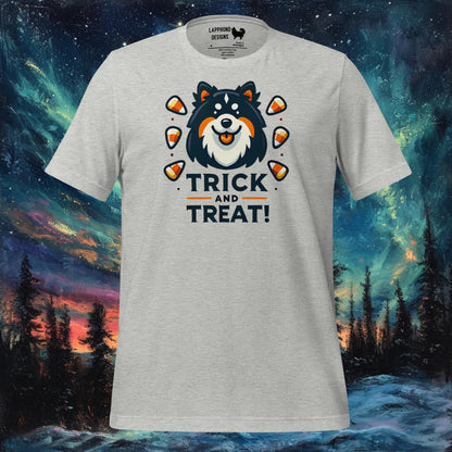 Grey t-shirt featuring a Finnish Lapphund surrounded by candy corn with 'Trick and Treat' text, perfect for Halloween and dog lovers.