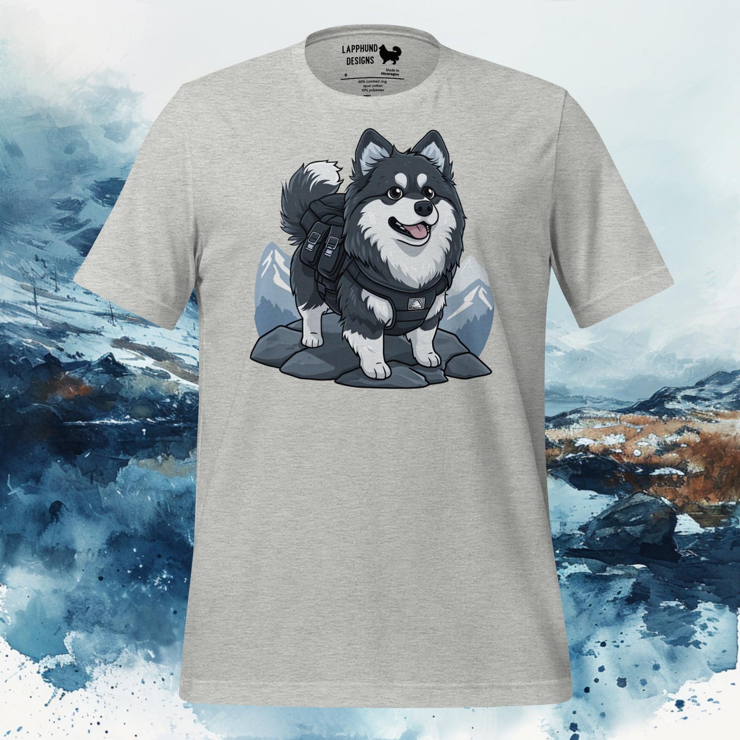 Grey t-shirt featuring a Finnish Lapphund in a backpack standing on rocks with mountains in the background, perfect for outdoor-loving dog owners.