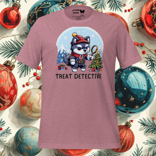 Treat Detective Finnish Lapphund Holiday T-Shirt featuring a detective Lapphund in a snowy Christmas scene, ideal for festive celebrations.