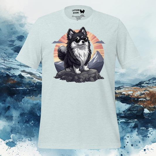 T-shirt featuring a Finnish Lapphund standing on a rocky mountain peak against a sunset, ideal for nature-loving and adventurous dog owners.