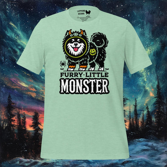 Mint t-shirt featuring a Finnish Lapphund in a monster costume with 'Furry Little Monster' text, perfect for Halloween and dog lovers.