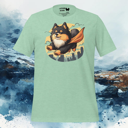 Light green t-shirt featuring a Finnish Lapphund flying through the sky with a superhero cape, perfect for adventurous dog-loving owners.