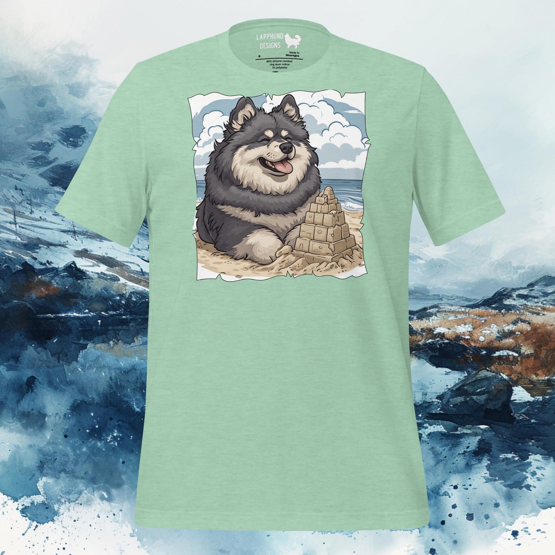 Mint green t-shirt featuring a Finnish Lapphund with a sandcastle, bringing beach vibes to your wardrobe.