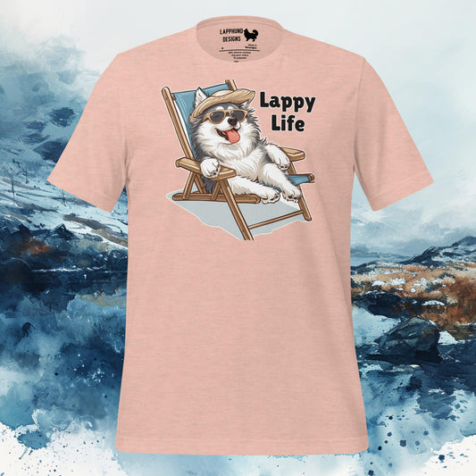 Peach-colored t-shirt featuring a Finnish Lapphund lounging in a beach chair with sunglasses, captioned 'Lappy Life.