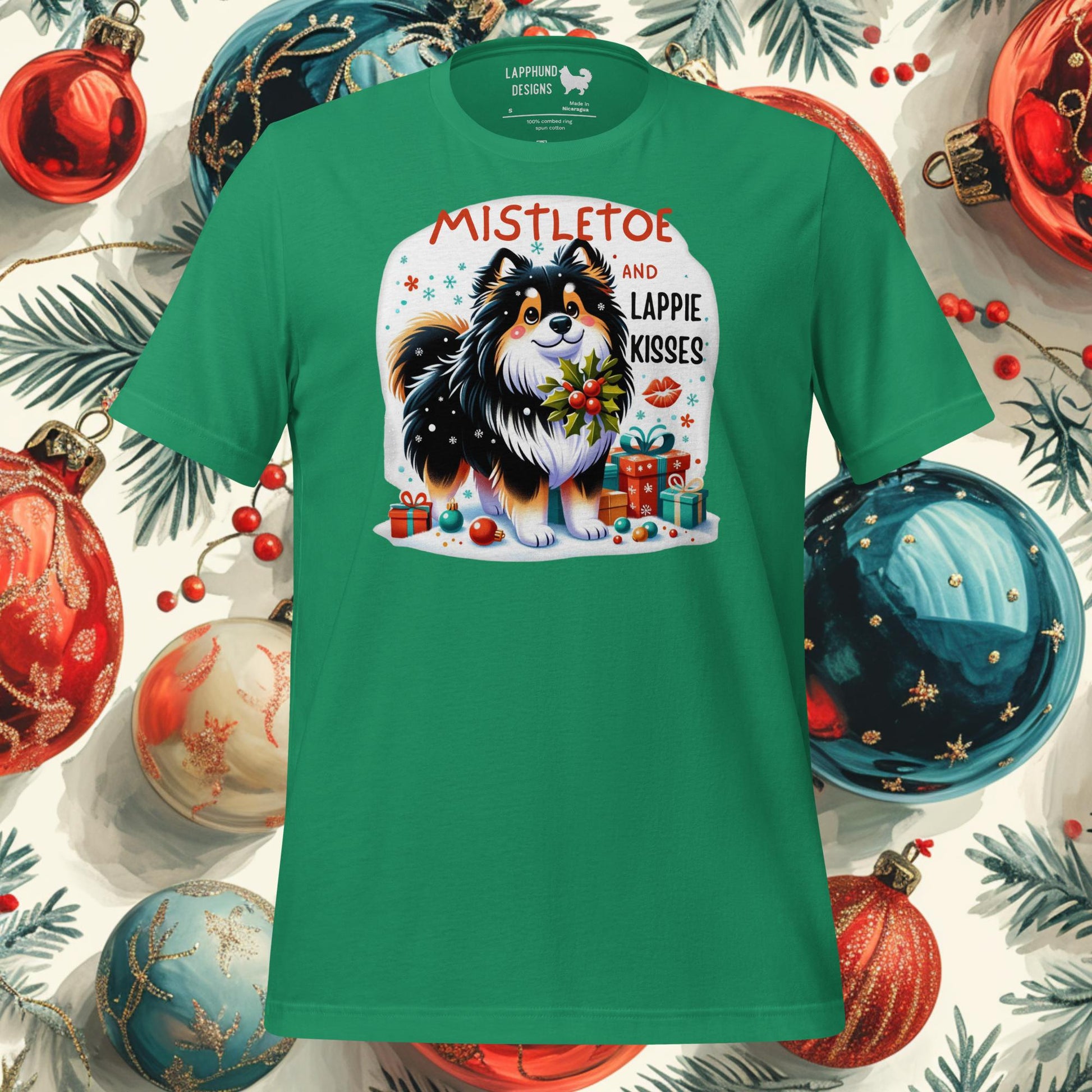 Mistletoe and Lappie Kisses Finnish Lapphund Christmas t-shirt featuring a Lapphund under mistletoe, surrounded by festive gifts.