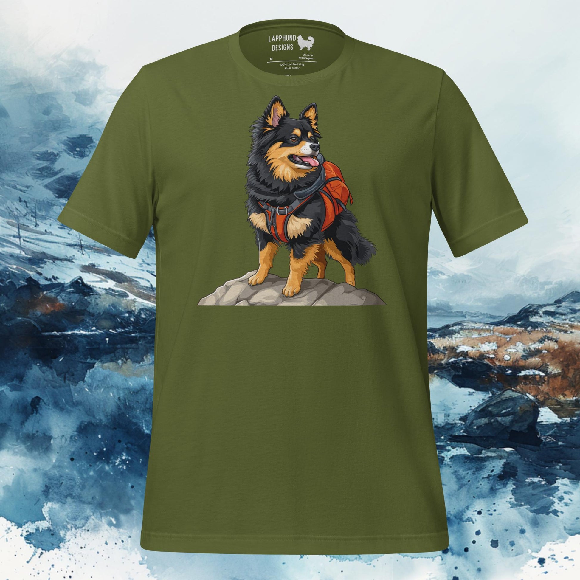 Olive t-shirt featuring a Finnish Lapphund with a red backpack standing on rocky terrain, perfect for outdoor-loving dog owners.