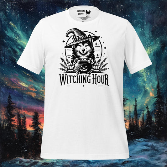 White t-shirt featuring a Finnish Lapphund dressed as a witch stirring a cauldron with 'Witching Hour' text, perfect for Halloween and dog lovers.