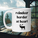 Finnish Lapphund Mug with "Reindeer Herder at Heart" text and reindeer silhouette—ideal for Nordic dog lovers and heritage fans. 

