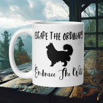 Finnish Lapphund Mug with "Escape the Ordinary Embrace the Wild" text and Lappie silhouette—ideal for Nordic dog lovers and wild fans.  

