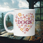 Finnish Lapphund Mug with a floral heart of paw prints and "Dogs" text—ideal for Nordic pet lovers and romantic gift seekers.  

