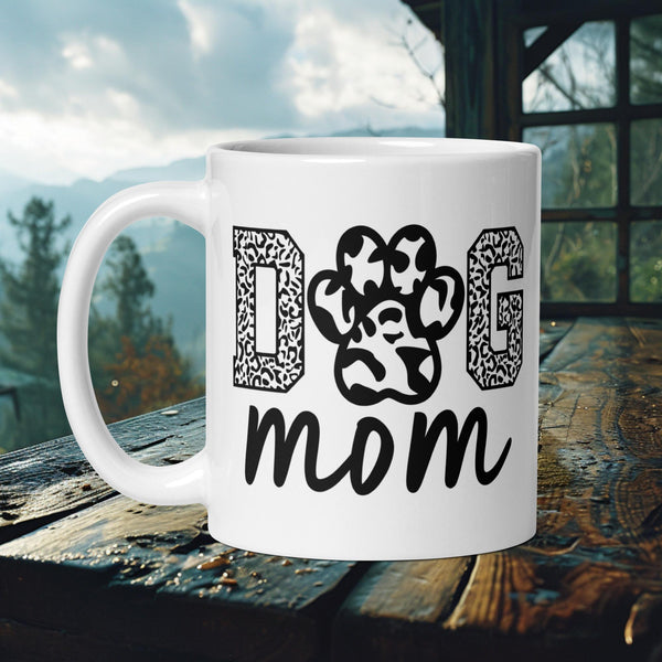 Finnish Lapphund Mug with "Dog Mom" text in paw print letters—ideal for Nordic dog lovers and pet moms.  

