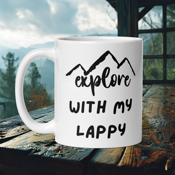 Finnish Lapphund Mug with "Explore With My Lappy" text and mountain silhouette—ideal for Nordic dog lovers and hikers.  


