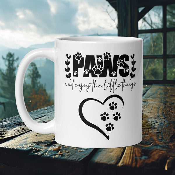 Finnish Lapphund Mug with "Paws Enjoy the Little Things" text and heart paw prints—ideal for Nordic dog lovers and mindful fans.  

