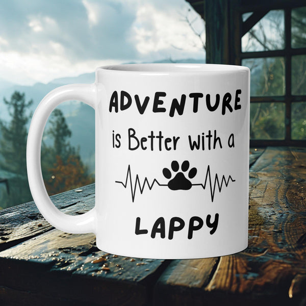 Finnish Lapphund Mug with "Adventure is Better With a Lappy" text and heartbeat paw print—ideal for dog lovers and adventurers.  


