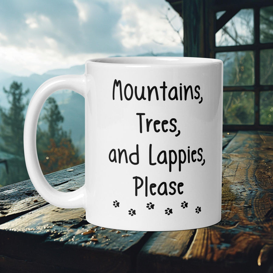 Finnish Lapphund Mug with "Mountains, Trees, and Lappies, Please" text and stars—ideal for dog lovers and nature enthusiasts.  

