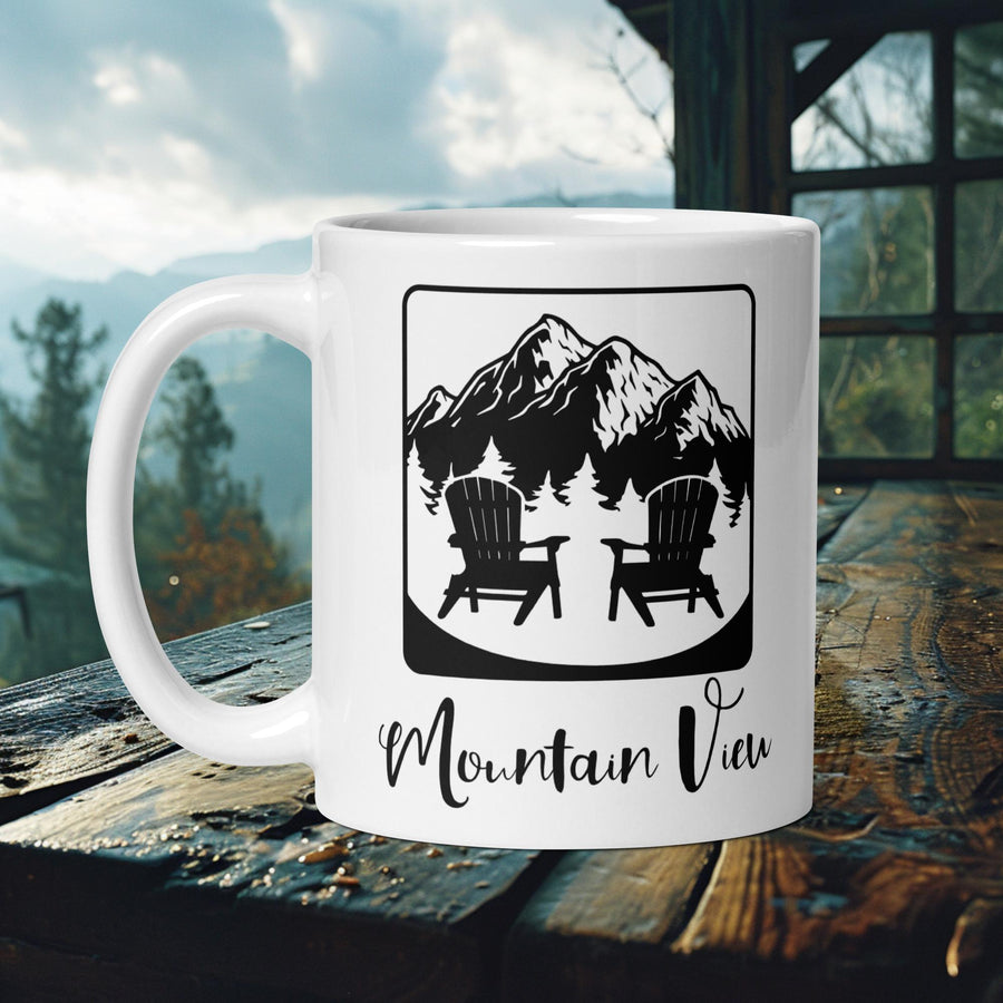 Finnish Lapphund Mug with "Mountain View" text and Adirondack chairs against mountains—ideal for dog lovers and nature fans. 

