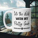 Finnish Lapphund Mug with "Into the Wild With My Fluffy Guide" text and paw print stars—ideal for pet fans and adventurers.  

