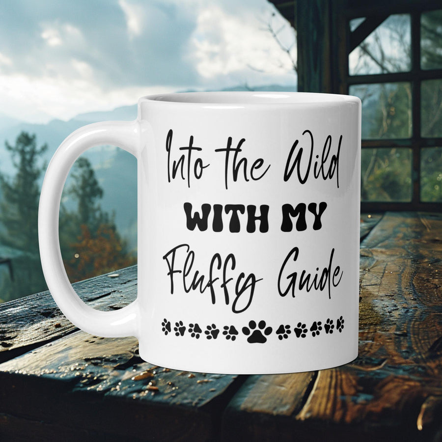 Finnish Lapphund Mug with "Into the Wild With My Fluffy Guide" text and paw print stars—ideal for pet fans and adventurers.  

