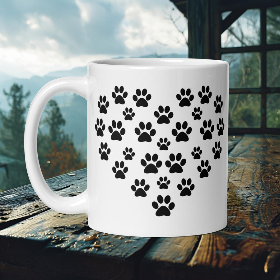 Finnish Lapphund Mug with a heart made of black paw prints—ideal for dog enthusiasts and minimalist art lovers.  


