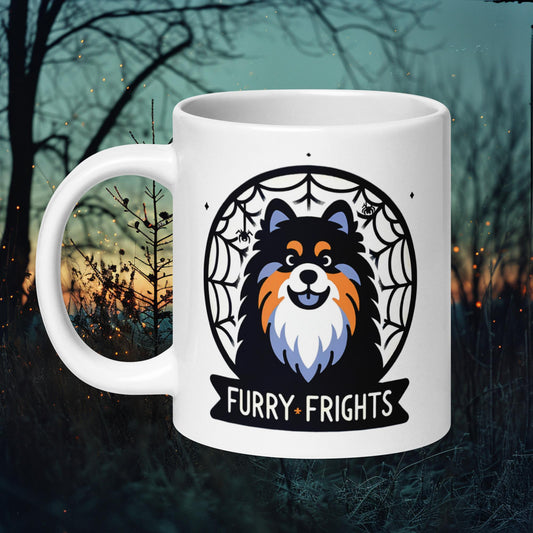 White ceramic mug featuring a Finnish Lapphund with a spider web background and the text 'Furry Frights,' perfect for Halloween enthusiasts and dog lovers.