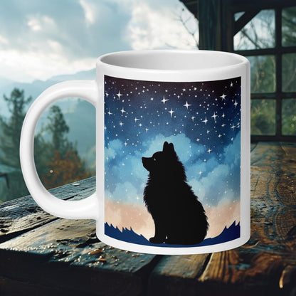 Ceramic mug featuring a Finnish Lapphund silhouette against a starry night sky, perfect for nature and dog lovers.