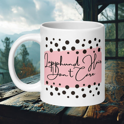 Ceramic mug with 'Lapphund Hair Don't Care' text in a pink and polka dot design, ideal for Lapphund lovers.