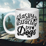 Finnish Lapphund Mug with "Easily Distracted by Dogs" text and heart paw prints—ideal for dog lovers and humor fans.  